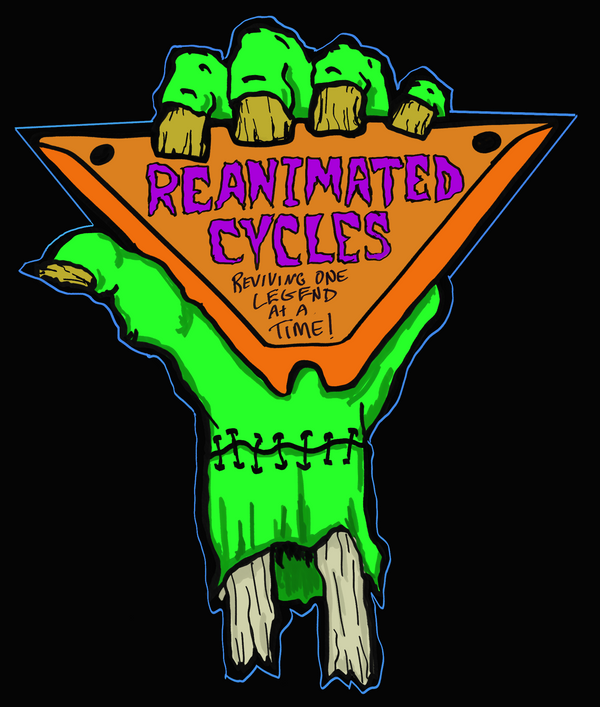 A stylized graphic of a green stitched monster hand holding an orange inverted triangle with the text 'REANIMATED CYCLES' 